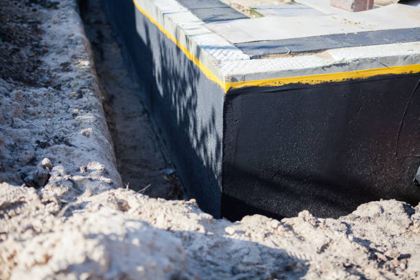 Professional Waterproofing technician working in Port Royal, SC